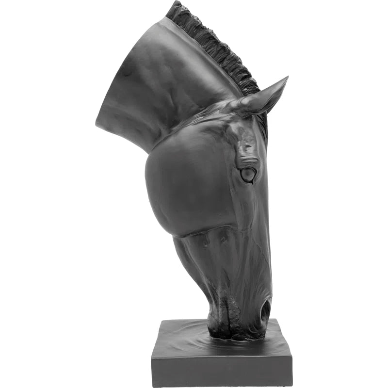 The artificial stone sculpture gives the impression that it could neigh at any moment, especially after indulging in the gently undulating water. It's not just equestrians who find themselves instinctively reaching out to stroke the noble black horse's he