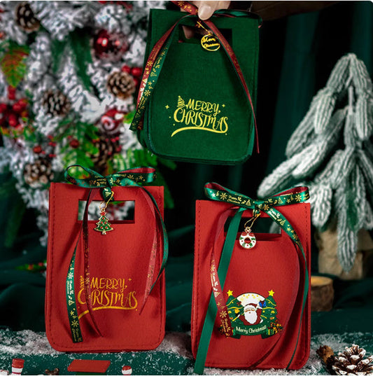 Three festive gift bags with 'Merry Christmas' text and designs against a Christmas-themed background.