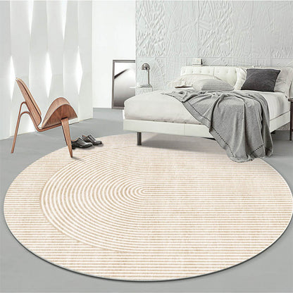 Modern Light Luxury Round Carpet with geometric pattern in a minimalist bedroom, diameter 120cm, polyester fiber, light luxury style.