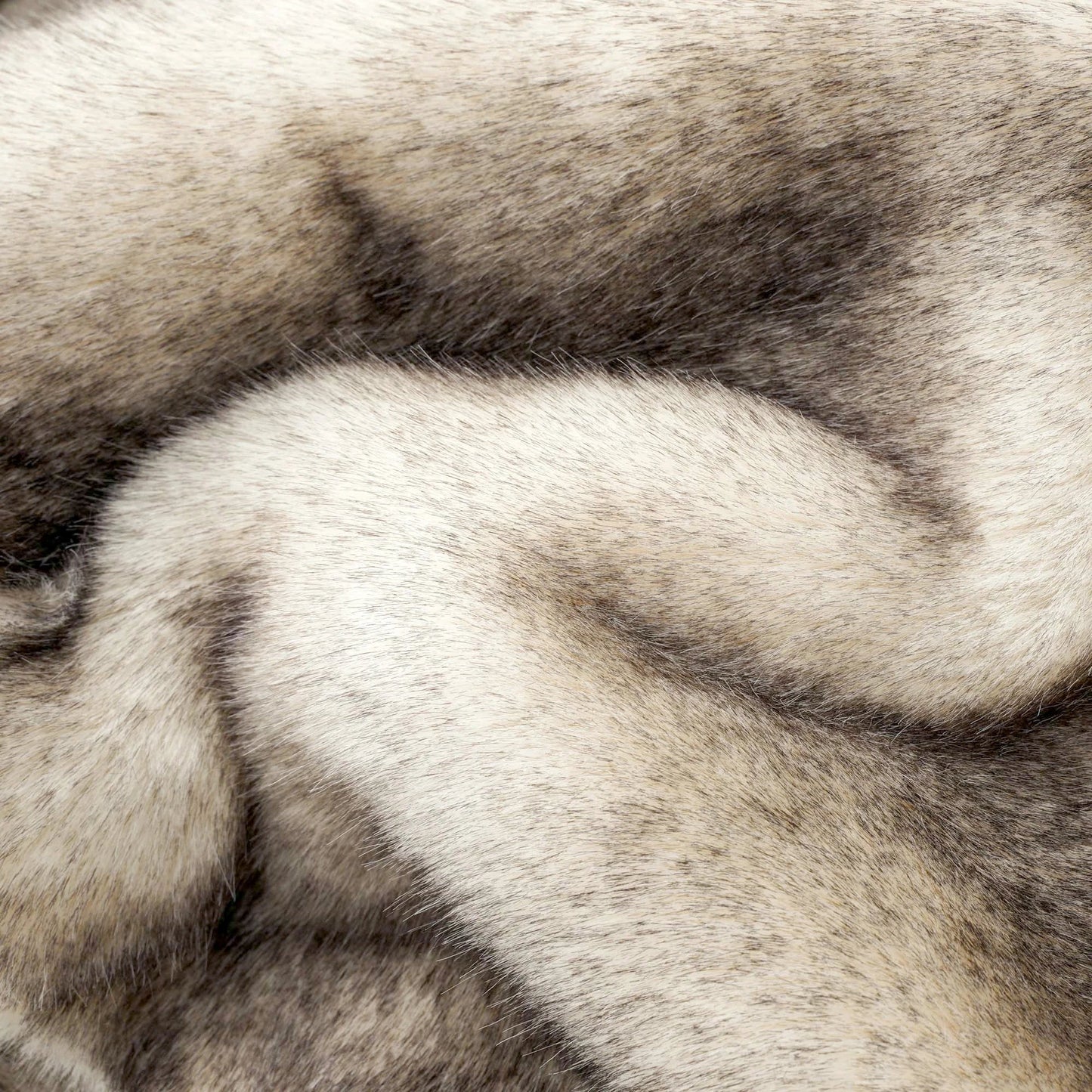 Close-up of fur with a mix of brown and beige colors