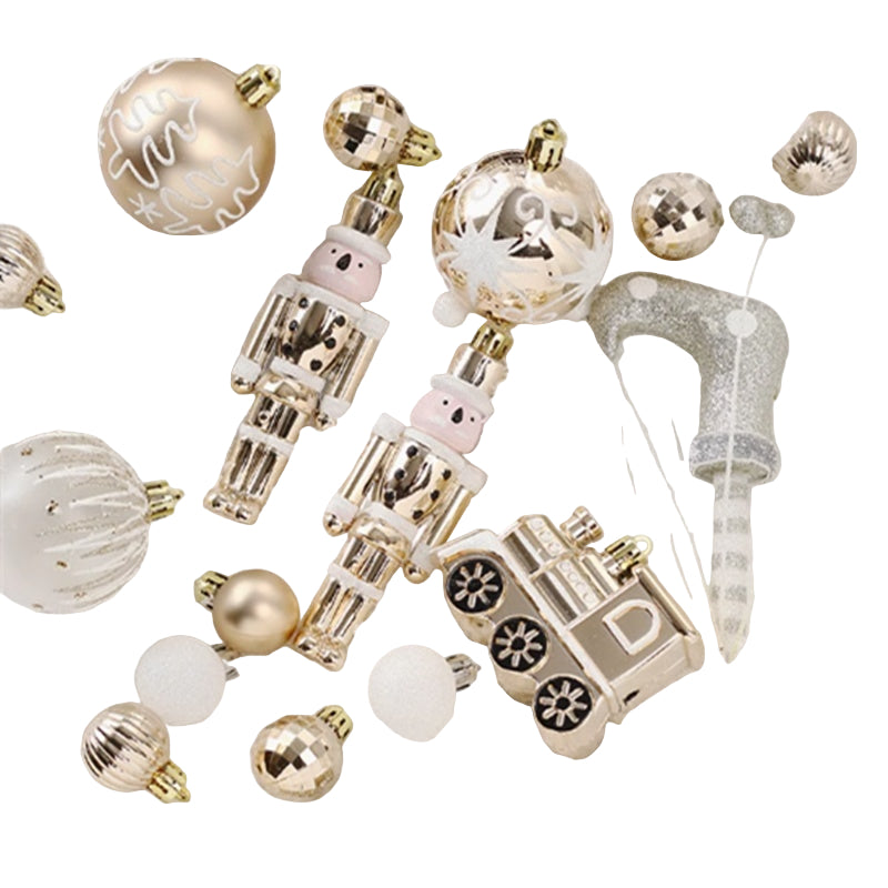 Decorative Christmas ornaments including gold and silver balls and a nutcracker figure on a textured surface.