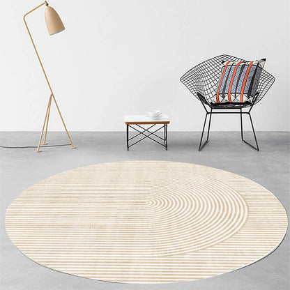 Modern Light Luxury Round Carpet with geometric abstraction pattern in a minimalist room setting bedroom, made of polyester fiber, 120cm diameter